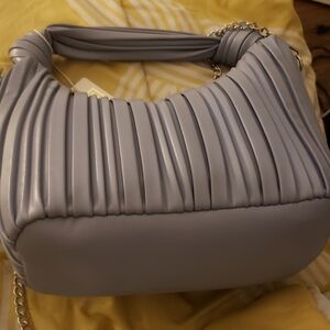 Stylish New Periwinkle Crossbody bag by Urban Expression. Front Zipper